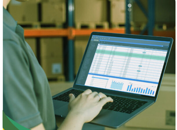 warehouse employee processing a return for DTC fufillment