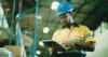 Man, tablet and warehouse inspection for supply chain, checklist or scroll for inventory management.